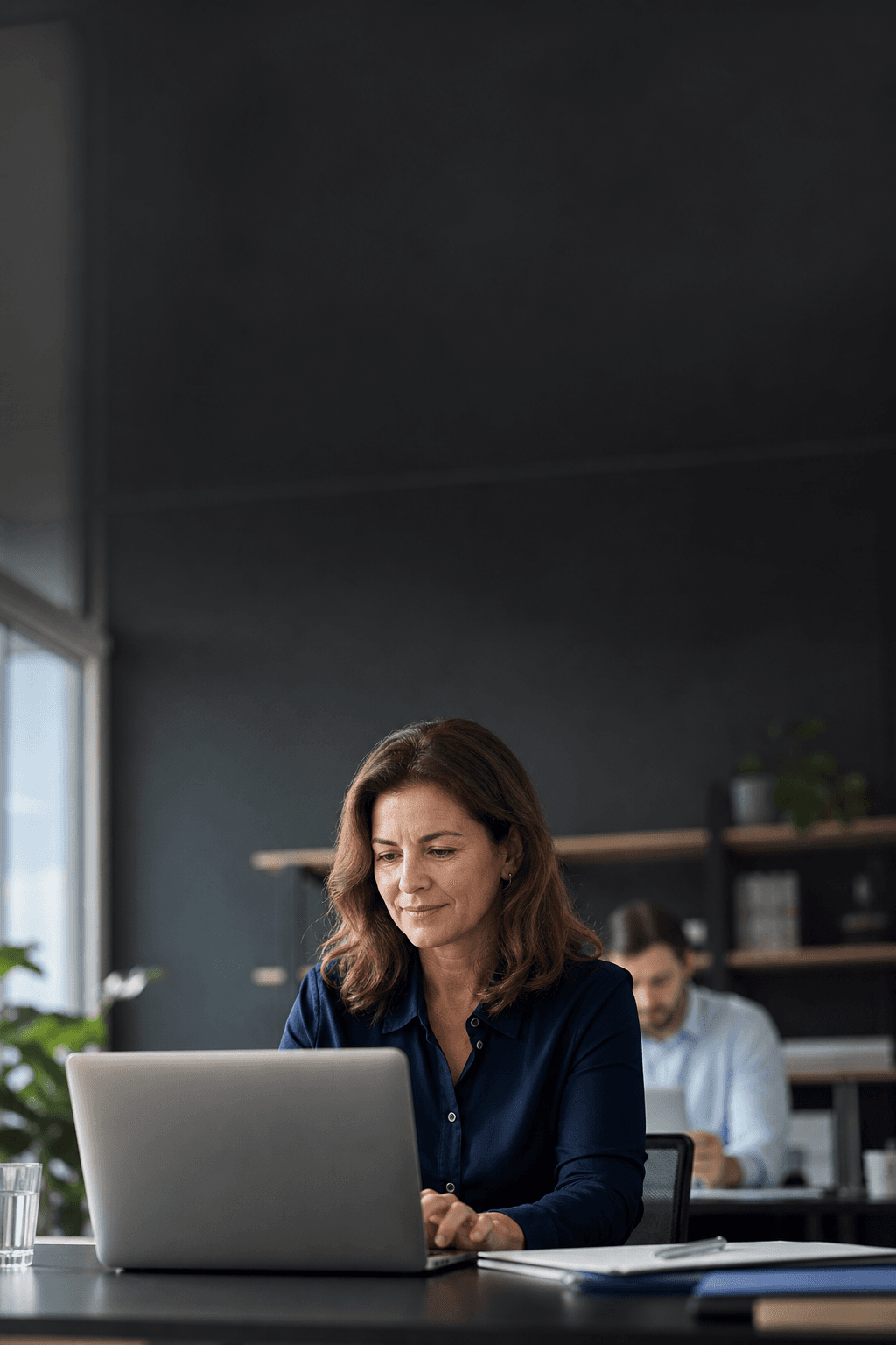 A company leader reviewing a secure team learning workspace